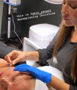 Clinical Esthetician Vivian Santiago performing dermaplaning